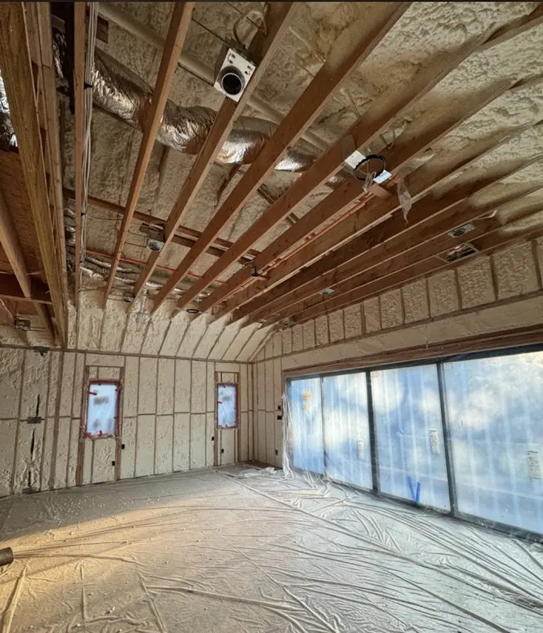 Interior walls and ceiling insulated with spray foam during new construction in Burtonsville